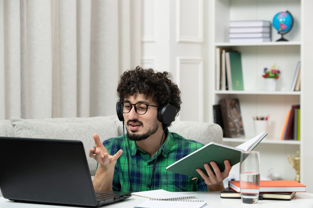 student-online-cute-young-guy-studying-computer-glasses-green-shirt-explaining-class (1) free course